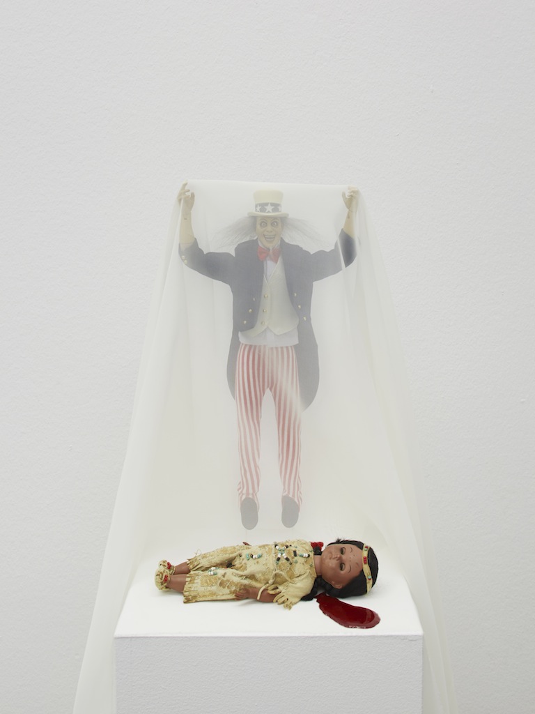 Danny McDonald, <i>This is What Happened</i>, 2015, Uncle Sam action figure, plastic leather vintage hair and doll beads, 39 x 22 x 22 cm